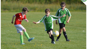 Daniel Keenagh tries to intercept a pass from a Newmarket Celtic player in the game between Sporting Ennistymon and Newmarket Celtic U10's. Game played in C.B.S Ennistymon.