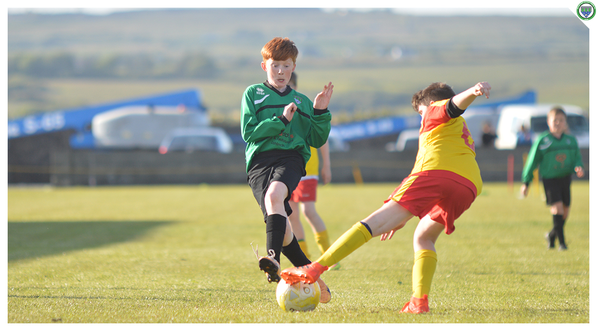 Darragh Cassidy attempts to block an Avenue United clearance in the U12 game between Sporting Ennistymon Football Club and Avenue United Football Club. Game played in Lahinch Sportsfield on the 11th of June 2019.