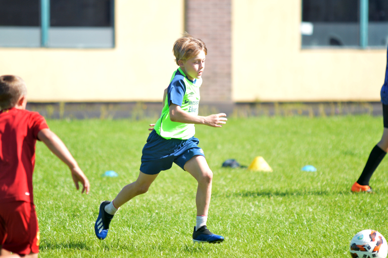 Hugo Roberts dribbles with the ball during Sporting Ennistymon F.C FAI Summer Camp 2020