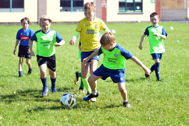 Players attempt to score during Sporting Ennistymon F.C FAI Summer Camp 2020