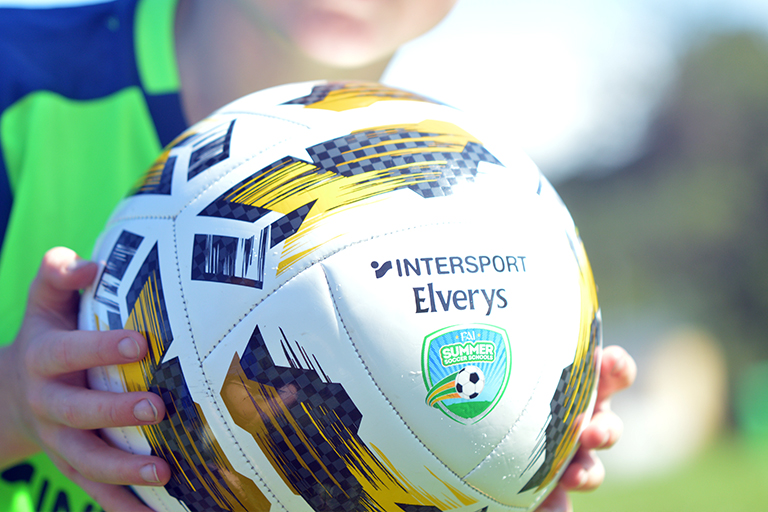 Intersport Elverys ball is held in the air by Andrew Birmingham during Sporting Ennistymon F.C FAI Summer Camp 2020
