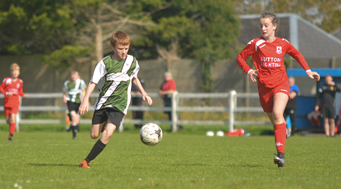 Darren O'Brien chases down a loose ball in the U13 Division 2 Cup Final between Sporting Ennistymon F.C and Lifford A.F.C in Frank Healy Park.