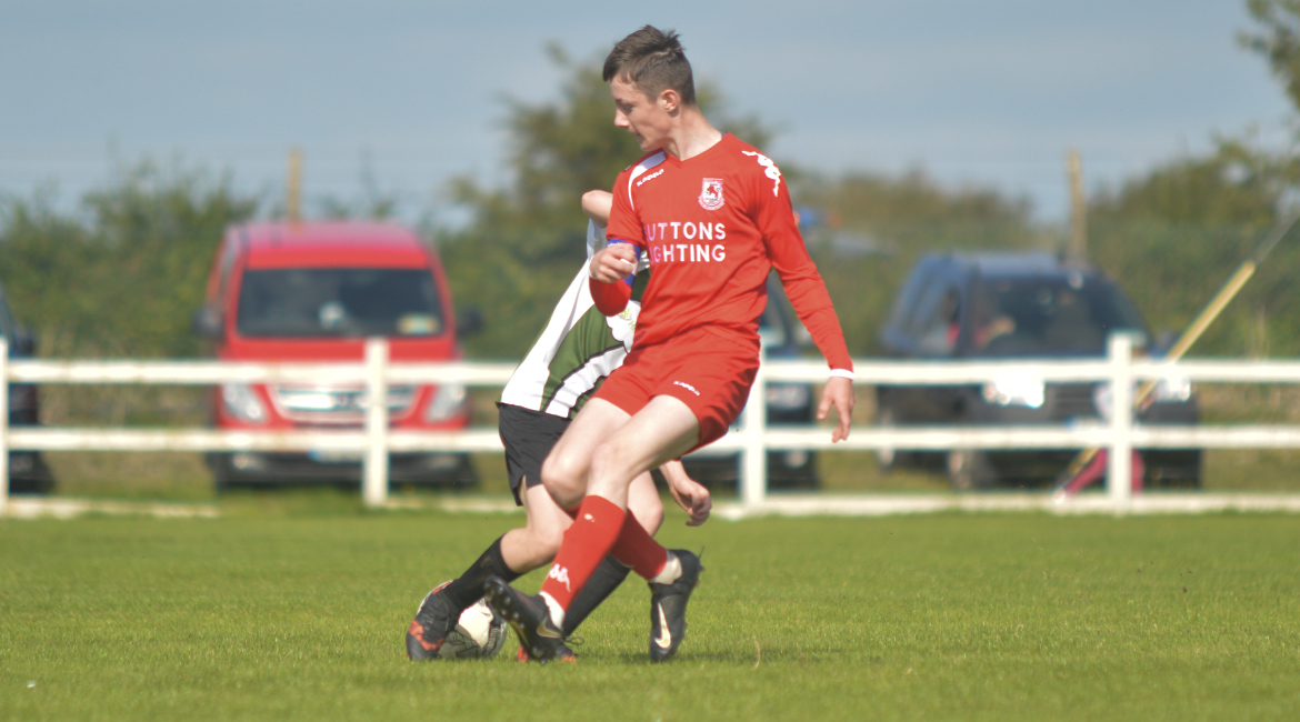 John O'Brien in possession during the U13 Division 2 Cup Final between Sporting Ennistymon F.C and Lifford A.F.C in Frank Healy Park.