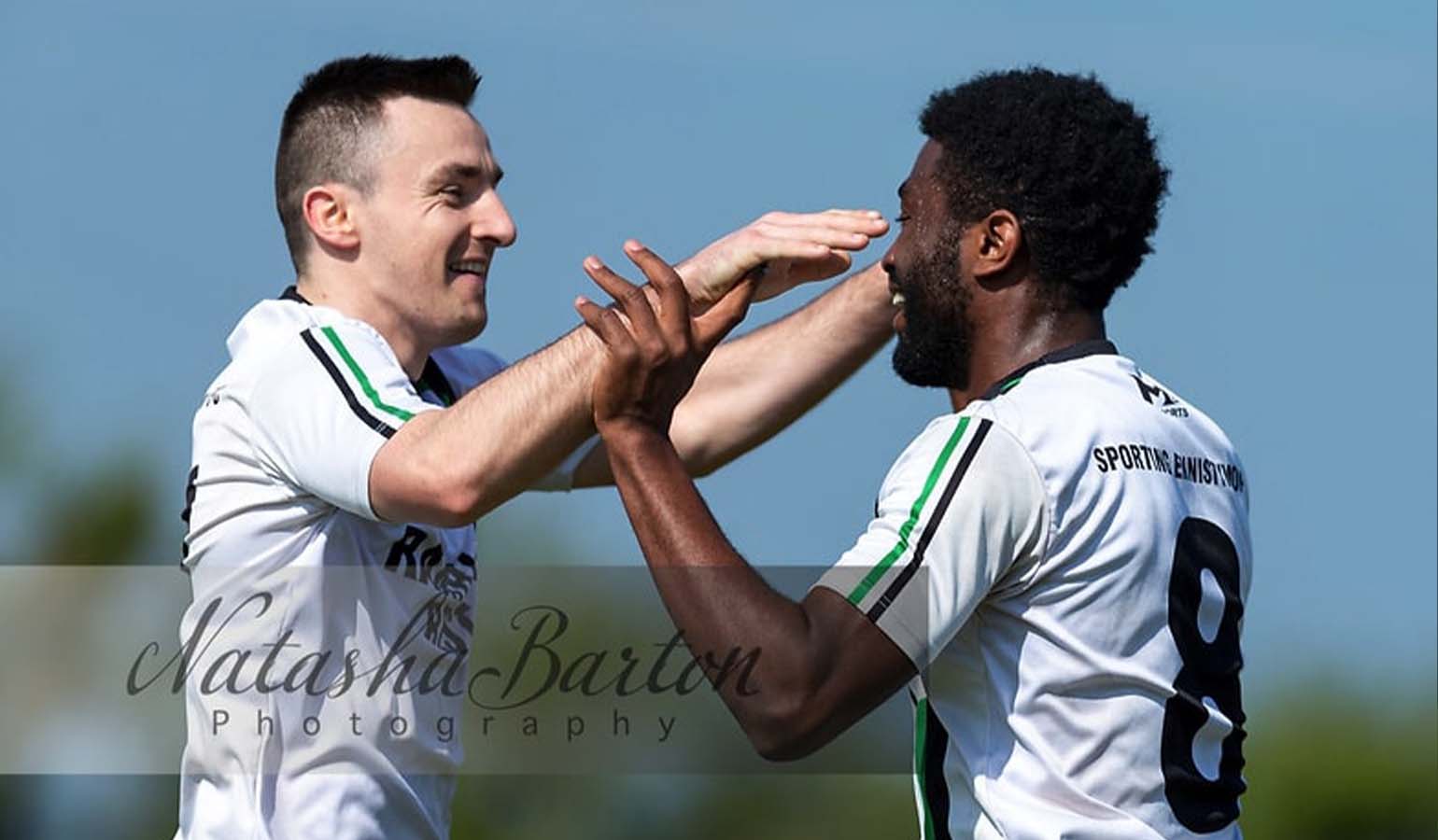 Sporting Ennistymon's Sean McConigley celebrates with a teammate following a goal. Photo credit - Natasha Barton Photography